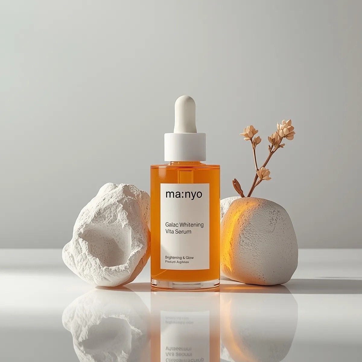 Amber Serum Bottle Surrounded by Stone and Flowers — image 4
