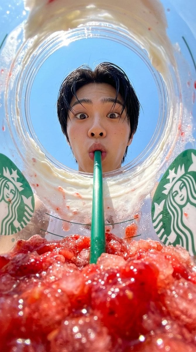 Starbucks Frappuccino Fisheye View with Person and Straw — image 2