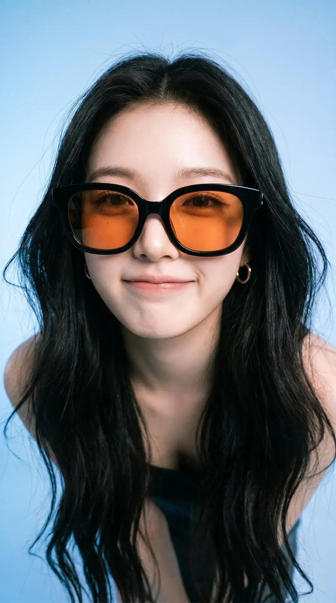 Editorial Portrait of a Woman in Sunglasses — image 2
